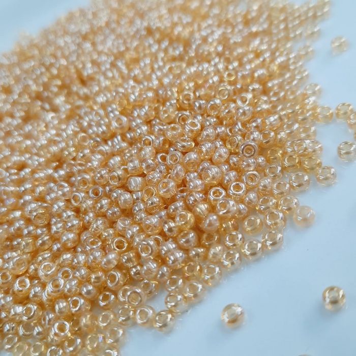 	Miçanga Asmara Transparente Lustrosa Mel Claro 16020 - 9/0(2,6mm) 500g