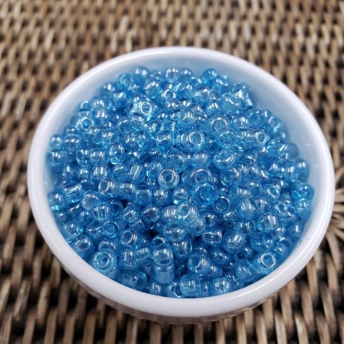 Miçanga Chinesa Transparente Lustrosa Azul 103* - 8/0(2,9mm) 500g