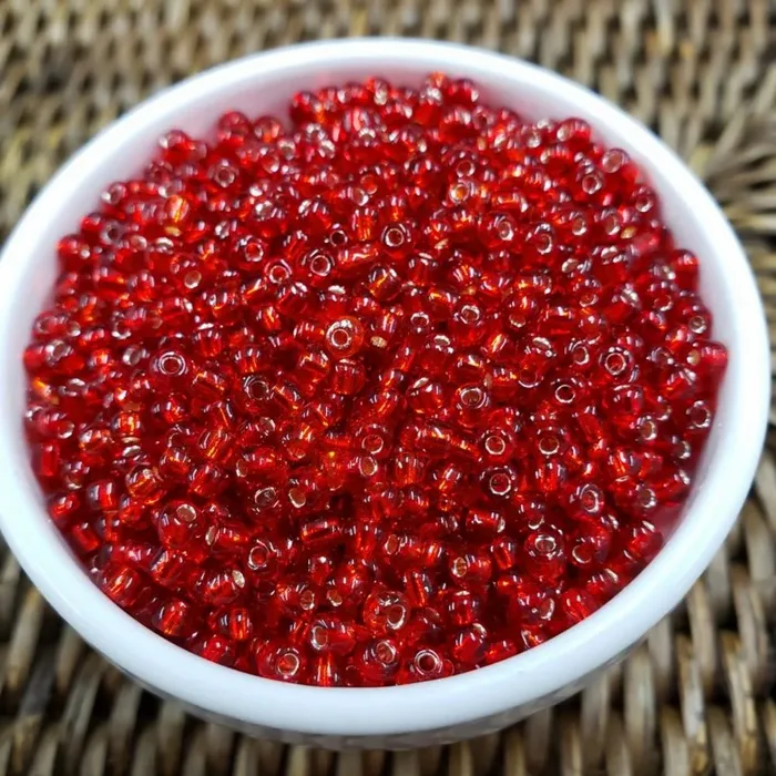 Miçanga Chinesa Transparente Vermelho 25B - 8/0(2,6mm) 25g Aprox. 900 peças