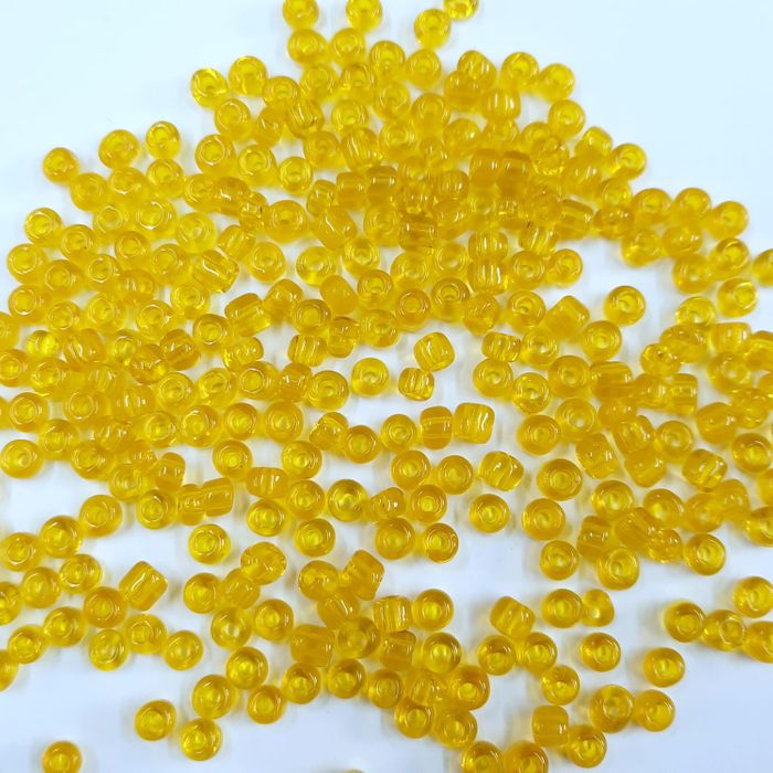 Miçanga Chinesa Transparente Amarela 10* - 6/0(4,1mm) 500g
