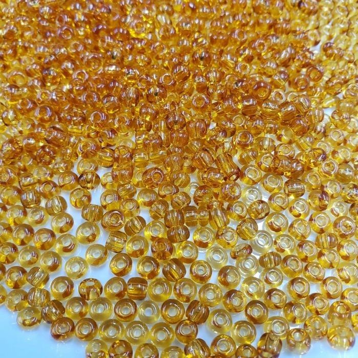 Miçanga Chinesa Transparente Mel 2B - 6/0(4,1mm) 500g