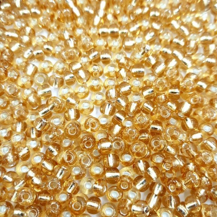 Miçanga Chinesa Transparente Mel Claro 22 - 6/0(4,1mm) 500g