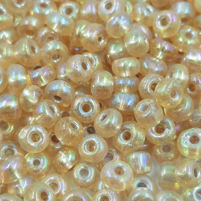 Miçanga Asmara Transparente Aurora Boreal Mel 17059 - 6/0(4,1mm) 25g Aprox. 300 Peças