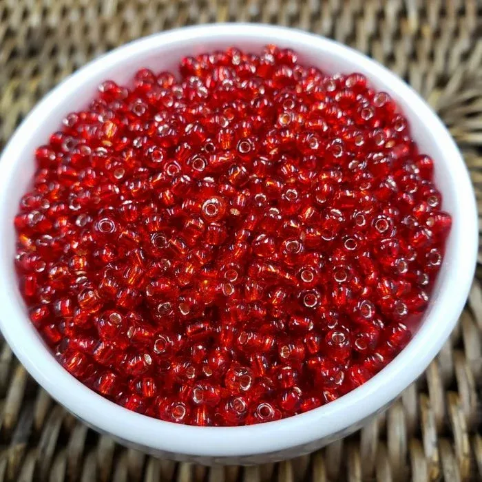 Miçanga Chinesa Transparente Vermelho 25B - 8/0(2,9mm) 500g