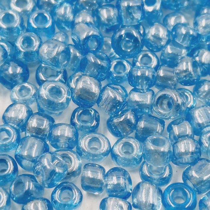 Miçanga Chinesa Transparente Lustrosa Azul 103 - 6/0(4,1mm) 25g Aprox. 260 Peças
