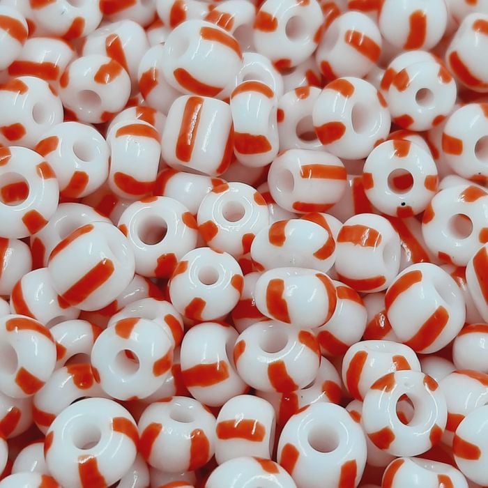 Miçanga Rajada Branco Com Vermelho - 6/0(4,1mm) 500g
