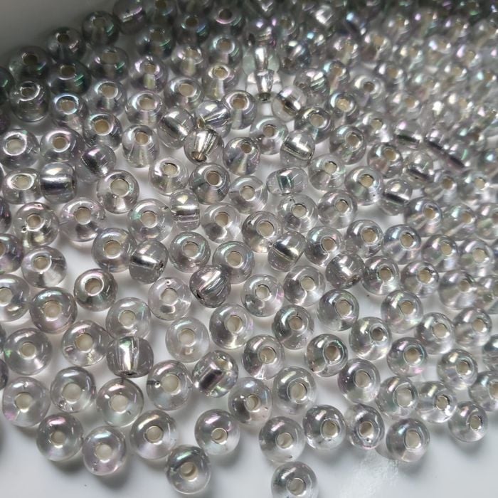 Miçanga Asmara Transparente Prata Aurora Boreal 78105 - 9/0(2,6mm) 500g