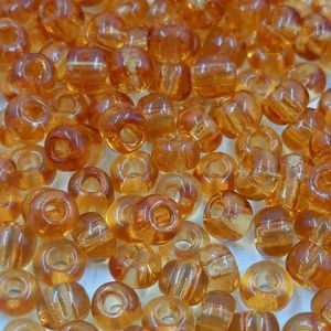 25g Miçanga Gold Transparente Topázio 2B - 6/0(4,1mm) Aprox. 260Peças